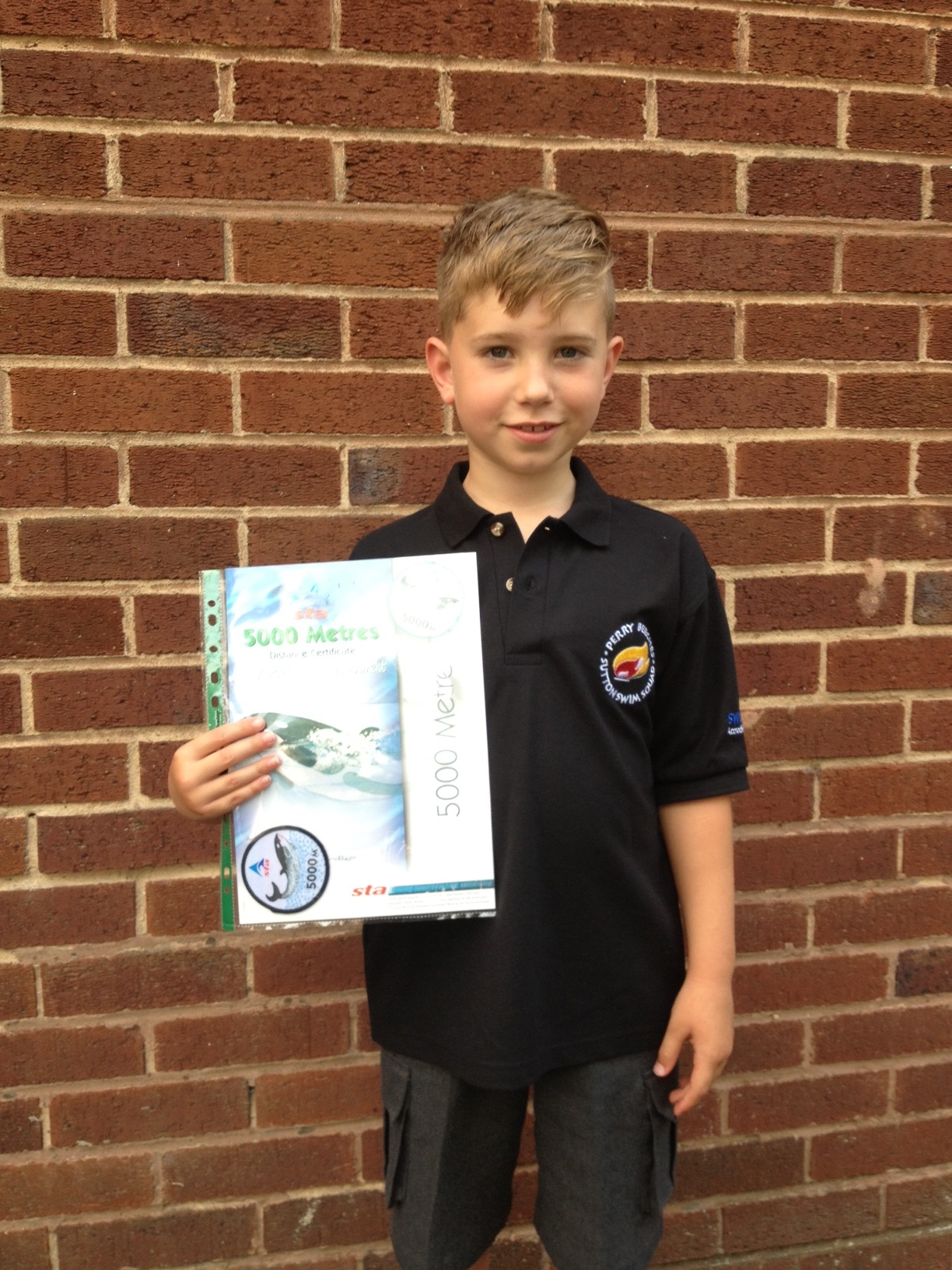 Lewis swims 5000 meters for the Birmingham Childrens Hospital